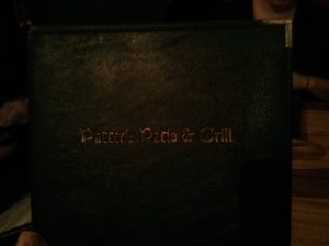i know it's dark, but i promise it says putters patio and grill.