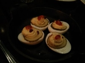 deviled farm eggs with bacon & sriracha.