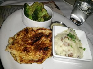 marinated chicken breast with smashed potatoes & broccoli.